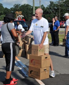 Concord people handing out items at first SHARE DAY